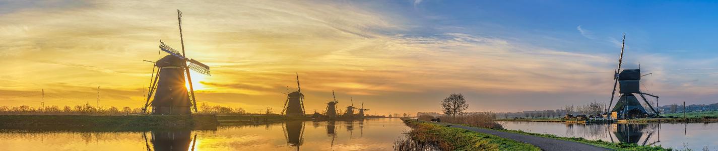 Rotterdam Netherlands, sunrise panorama nature landscape of Dutch Windmill at Kinderdijk Village
